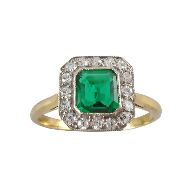 Emerald and diamond cluster ring, of cut-corner rectangular outline, the emerald cut emerald approximately 0.55ct, | MasterArt